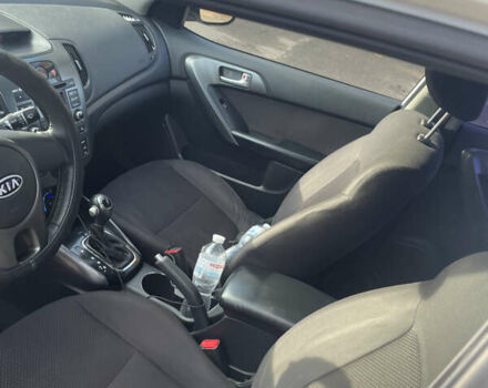 Білий Кіа Черато, об'ємом двигуна 1.6 л та пробігом 180 тис. км за 7500 $, фото 7 на Automoto.ua