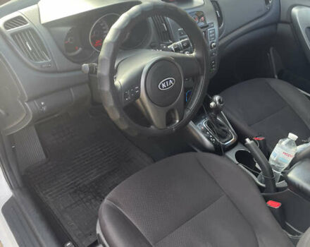 Білий Кіа Черато, об'ємом двигуна 1.6 л та пробігом 180 тис. км за 7500 $, фото 8 на Automoto.ua