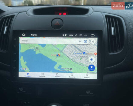 Білий Кіа Черато, об'ємом двигуна 1.59 л та пробігом 154 тис. км за 7500 $, фото 14 на Automoto.ua