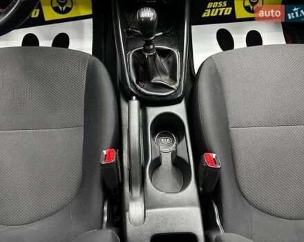 Білий Кіа Черато, об'ємом двигуна 1.59 л та пробігом 180 тис. км за 6300 $, фото 10 на Automoto.ua