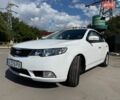 Білий Кіа Черато, об'ємом двигуна 2 л та пробігом 131 тис. км за 7999 $, фото 1 на Automoto.ua