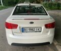 Белый Киа Черато, объемом двигателя 2 л и пробегом 220 тыс. км за 6787 $, фото 1 на Automoto.ua