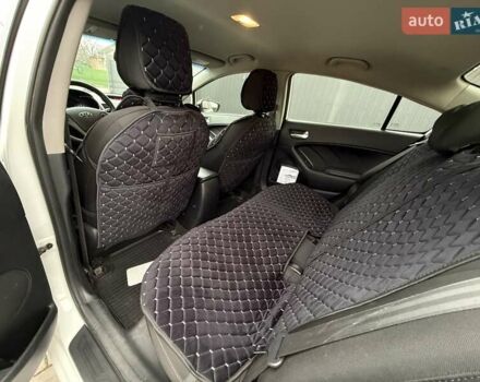 Білий Кіа Черато, об'ємом двигуна 1.6 л та пробігом 100 тис. км за 8300 $, фото 16 на Automoto.ua