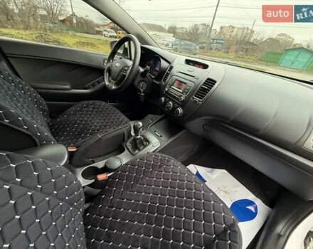 Білий Кіа Черато, об'ємом двигуна 1.6 л та пробігом 100 тис. км за 8300 $, фото 14 на Automoto.ua