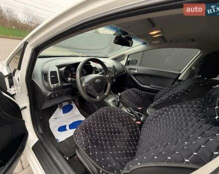Білий Кіа Черато, об'ємом двигуна 1.6 л та пробігом 100 тис. км за 8300 $, фото 17 на Automoto.ua