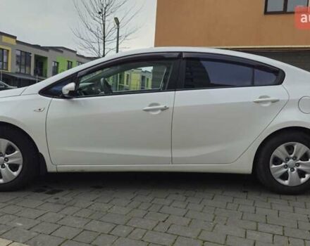 Белый Киа Черато, объемом двигателя 1.6 л и пробегом 130 тыс. км за 7700 $, фото 10 на Automoto.ua