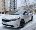 Білий Кіа Черато, об'ємом двигуна 2 л та пробігом 122 тис. км за 10500 $, фото 1 на Automoto.ua