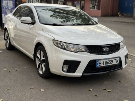 Білий Кіа Черато, об'ємом двигуна 2 л та пробігом 110 тис. км за 9494 $, фото 1 на Automoto.ua