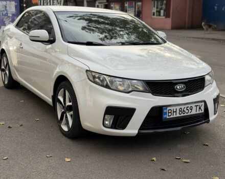 Білий Кіа Черато, об'ємом двигуна 2 л та пробігом 110 тис. км за 9494 $, фото 1 на Automoto.ua