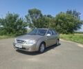 Бежевий Кіа Черато, об'ємом двигуна 2 л та пробігом 146 тис. км за 4500 $, фото 1 на Automoto.ua