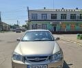 Бежевий Кіа Черато, об'ємом двигуна 2 л та пробігом 146 тис. км за 4500 $, фото 19 на Automoto.ua