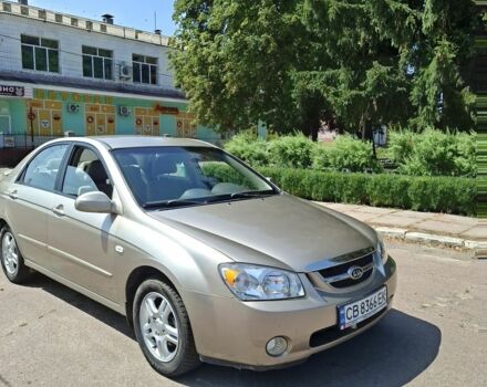 Бежевий Кіа Черато, об'ємом двигуна 2 л та пробігом 146 тис. км за 4500 $, фото 18 на Automoto.ua