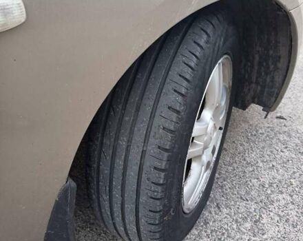 Бежевий Кіа Черато, об'ємом двигуна 2 л та пробігом 187 тис. км за 4700 $, фото 6 на Automoto.ua