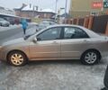 Бежевый Киа Черато, объемом двигателя 1.6 л и пробегом 230 тыс. км за 5400 $, фото 3 на Automoto.ua