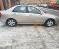 Бежевый Киа Черато, объемом двигателя 1.6 л и пробегом 230 тыс. км за 5400 $, фото 2 на Automoto.ua