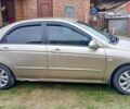 Киа Черато 2006 в Краматорске на Automoto.ua Бежевый Киа Черато, объемом двигателя 1.6 л и пробегом 150 тыс. км за 3900 $, фото 5 на Automoto.ua