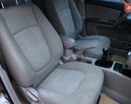 Бежевый Киа Черато, объемом двигателя 1.59 л и пробегом 202 тыс. км за 4800 $, фото 24 на Automoto.ua