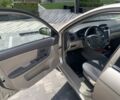 Бежевый Киа Черато, объемом двигателя 2 л и пробегом 216 тыс. км за 3400 $, фото 13 на Automoto.ua