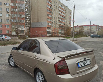 Бежевый Киа Черато, объемом двигателя 1.98 л и пробегом 212 тыс. км за 4500 $, фото 4 на Automoto.ua