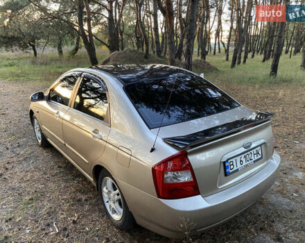 Бежевий Кіа Черато, об'ємом двигуна 1.6 л та пробігом 285 тис. км за 5300 $, фото 10 на Automoto.ua