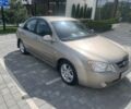 Бежевый Киа Черато, объемом двигателя 2 л и пробегом 216 тыс. км за 3400 $, фото 1 на Automoto.ua