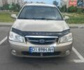 Бежевый Киа Черато, объемом двигателя 2 л и пробегом 200 тыс. км за 2900 $, фото 1 на Automoto.ua