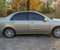Кіа Черато 2006 у Покров (Орджонікідзе) на Automoto.ua Бежевий Кіа Черато, об'ємом двигуна 1.98 л та пробігом 275 тис. км за 4000 $, фото 4 на Automoto.ua