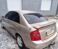 Бежевый Киа Черато, объемом двигателя 1.98 л и пробегом 252 тыс. км за 4900 $, фото 1 на Automoto.ua