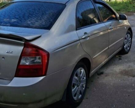 Бежевый Киа Черато, объемом двигателя 2 л и пробегом 200 тыс. км за 3750 $, фото 6 на Automoto.ua