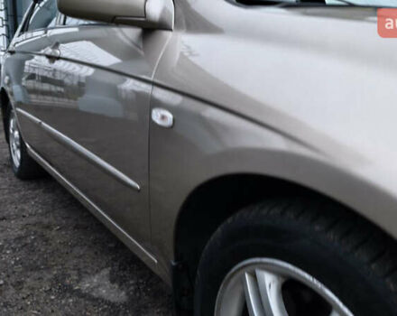 Бежевый Киа Черато, объемом двигателя 1.59 л и пробегом 202 тыс. км за 4800 $, фото 11 на Automoto.ua