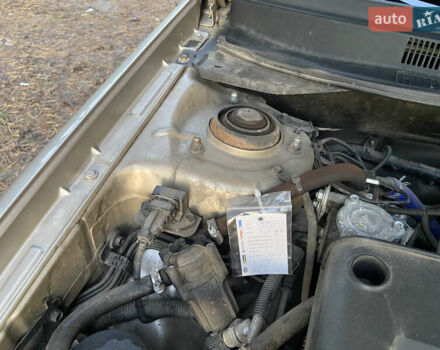 Бежевий Кіа Черато, об'ємом двигуна 1.6 л та пробігом 285 тис. км за 5300 $, фото 31 на Automoto.ua