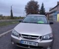 Бежевий Кіа Черато, об'ємом двигуна 1.6 л та пробігом 350 тис. км за 2950 $, фото 5 на Automoto.ua
