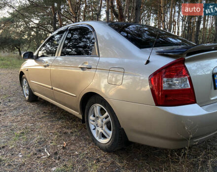 Бежевий Кіа Черато, об'ємом двигуна 1.6 л та пробігом 285 тис. км за 5300 $, фото 11 на Automoto.ua