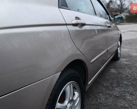 Бежевый Киа Черато, объемом двигателя 1.59 л и пробегом 202 тыс. км за 4800 $, фото 19 на Automoto.ua