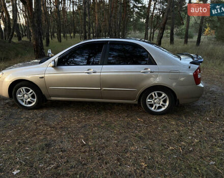 Бежевий Кіа Черато, об'ємом двигуна 1.6 л та пробігом 285 тис. км за 5300 $, фото 14 на Automoto.ua
