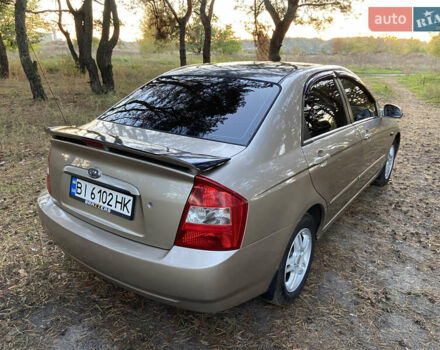 Бежевий Кіа Черато, об'ємом двигуна 1.6 л та пробігом 285 тис. км за 5300 $, фото 5 на Automoto.ua