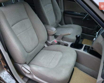 Бежевый Киа Черато, объемом двигателя 1.59 л и пробегом 202 тыс. км за 4800 $, фото 22 на Automoto.ua