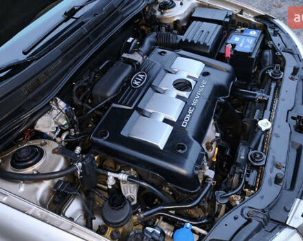 Бежевый Киа Черато, объемом двигателя 1.59 л и пробегом 202 тыс. км за 4800 $, фото 31 на Automoto.ua