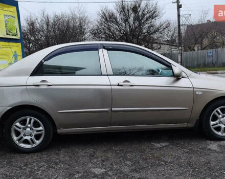 Бежевый Киа Черато, объемом двигателя 1.59 л и пробегом 202 тыс. км за 4800 $, фото 13 на Automoto.ua