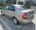 Бежевый Киа Черато, объемом двигателя 2 л и пробегом 216 тыс. км за 3400 $, фото 6 на Automoto.ua