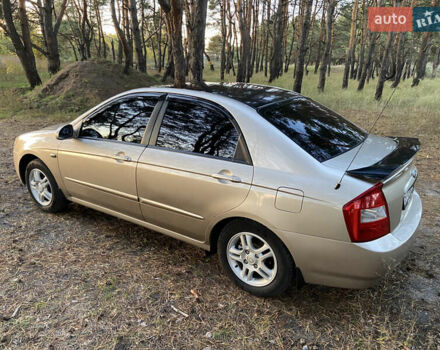 Бежевий Кіа Черато, об'ємом двигуна 1.6 л та пробігом 285 тис. км за 5300 $, фото 15 на Automoto.ua