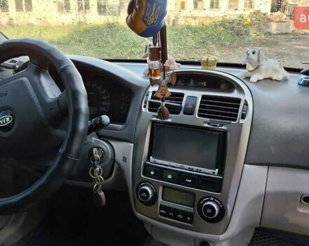 Бежевый Киа Черато, объемом двигателя 2 л и пробегом 200 тыс. км за 3750 $, фото 1 на Automoto.ua