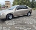 Бежевый Киа Черато, объемом двигателя 2 л и пробегом 197 тыс. км за 5300 $, фото 1 на Automoto.ua