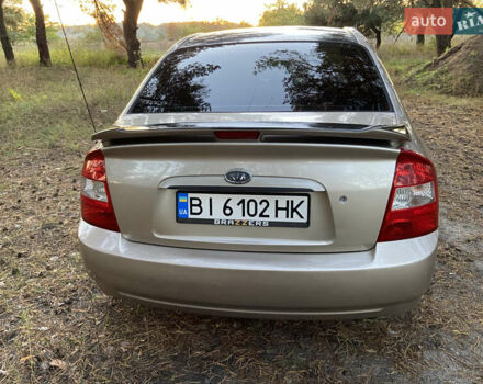 Бежевий Кіа Черато, об'ємом двигуна 1.6 л та пробігом 285 тис. км за 5300 $, фото 7 на Automoto.ua