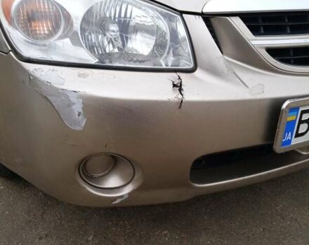 Бежевий Кіа Черато, об'ємом двигуна 1.6 л та пробігом 300 тис. км за 4300 $, фото 8 на Automoto.ua