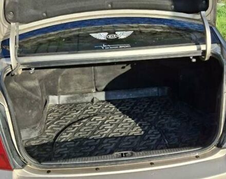 Бежевый Киа Черато, объемом двигателя 2 л и пробегом 200 тыс. км за 3750 $, фото 5 на Automoto.ua