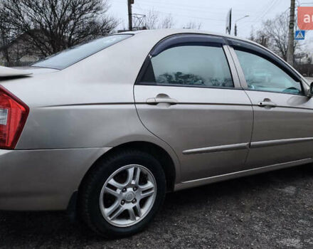 Бежевый Киа Черато, объемом двигателя 1.59 л и пробегом 202 тыс. км за 4800 $, фото 12 на Automoto.ua