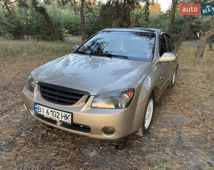 Бежевий Кіа Черато, об'ємом двигуна 1.6 л та пробігом 285 тис. км за 5300 $, фото 3 на Automoto.ua