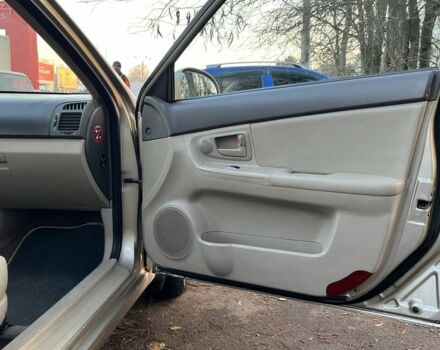 Бежевый Киа Черато, объемом двигателя 1.6 л и пробегом 268 тыс. км за 3900 $, фото 5 на Automoto.ua