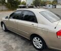 Бежевый Киа Черато, объемом двигателя 1.6 л и пробегом 185 тыс. км за 5000 $, фото 1 на Automoto.ua